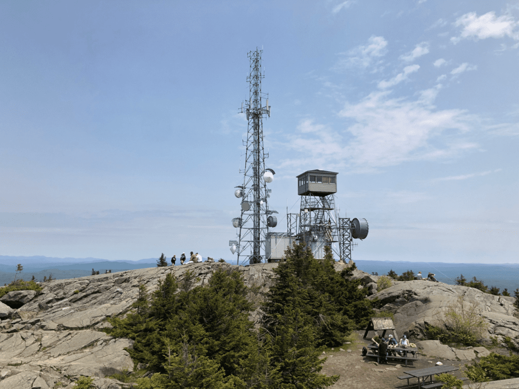 Tower at the wide open summit of Mount Kearsarge